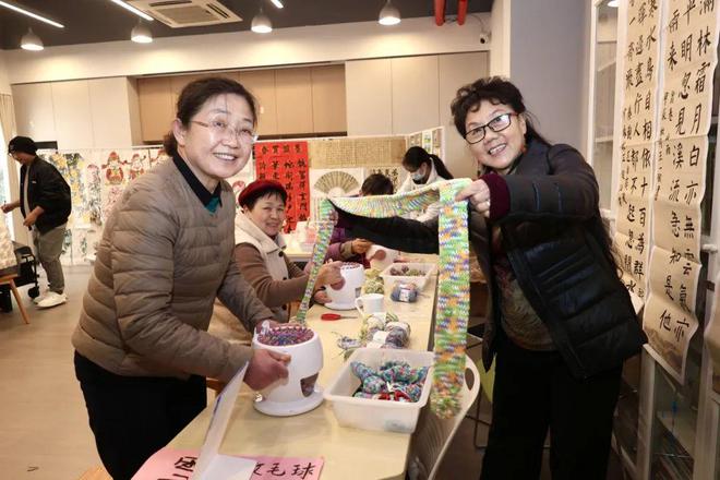 心公益集市红红火火年味十足k8凯发一触即发居民的爱(图2)